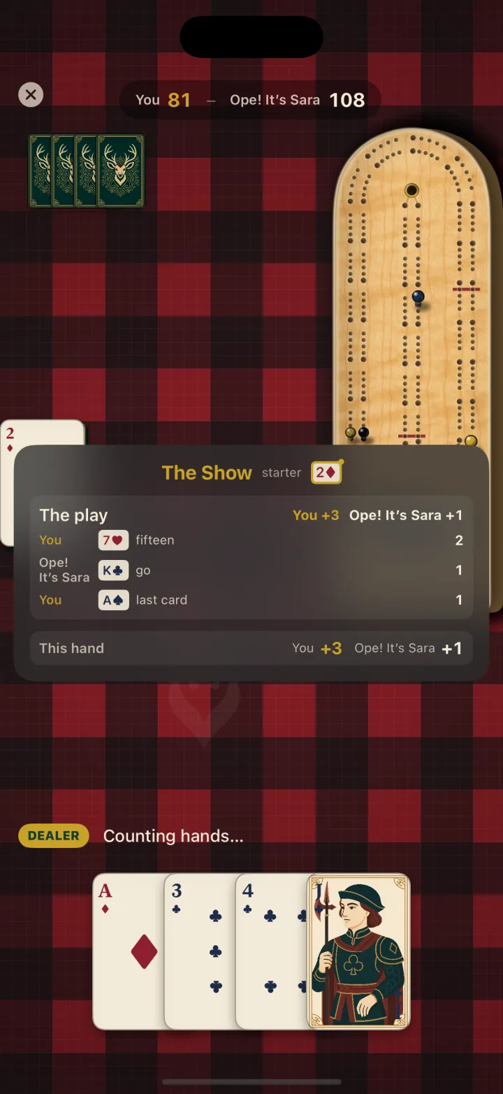 Camp Cribbage showing the play-by-play score, a maple U.P. board, and a hand of cards